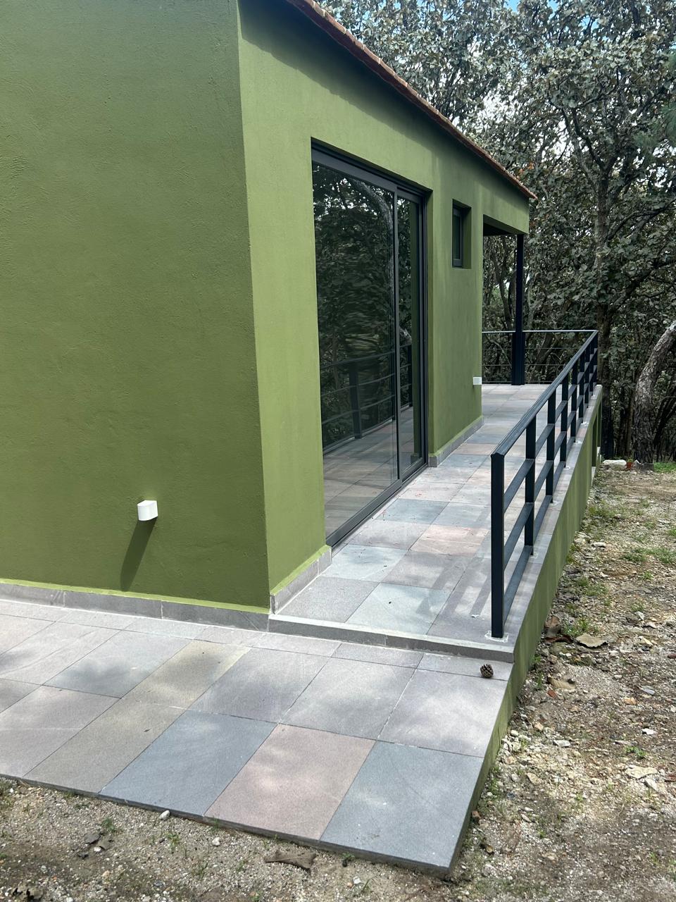 Fachada en verde con Nanoflex Color